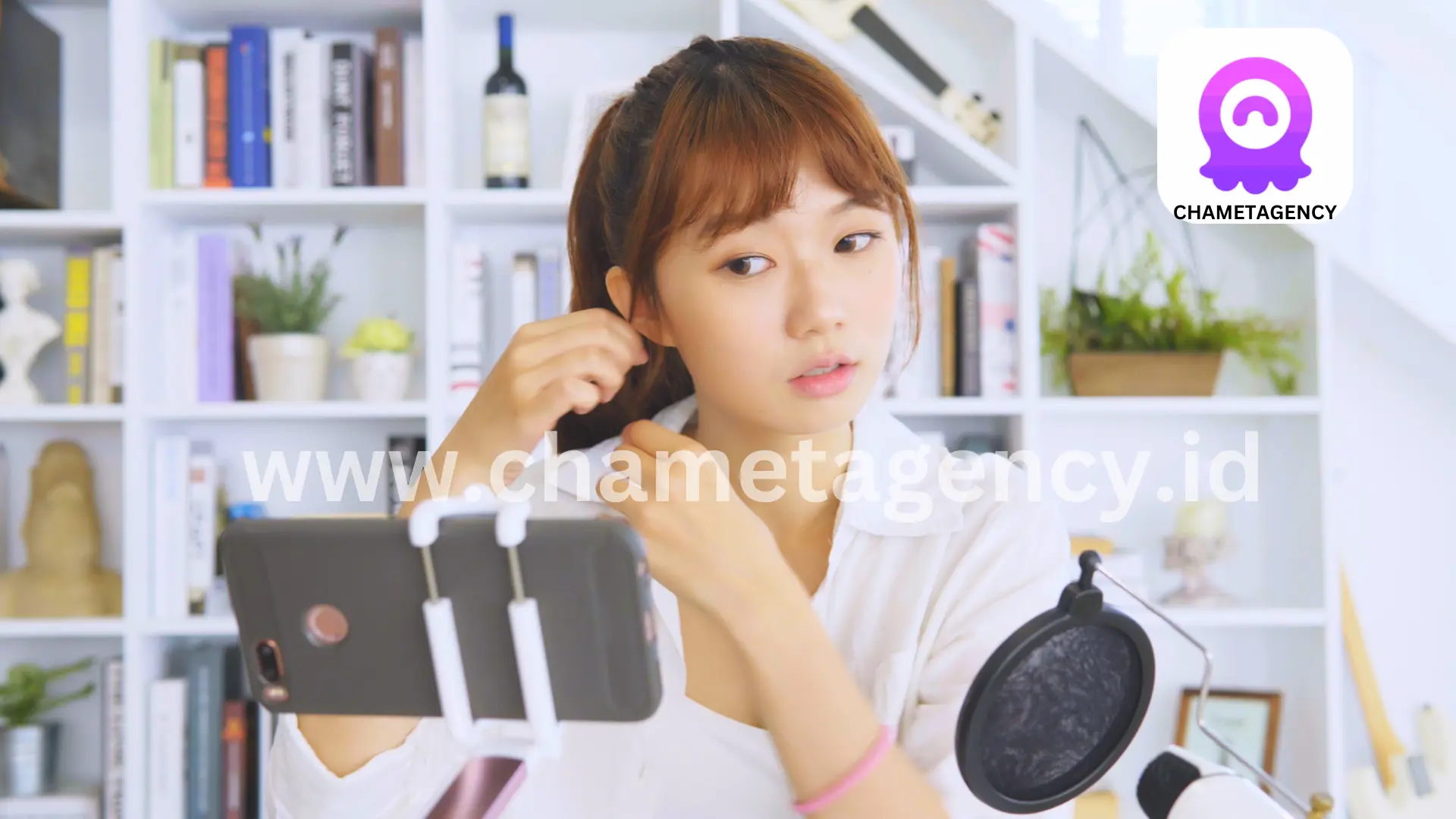 A magnifying glass scrutinizing the Chamet logo for legitimacy